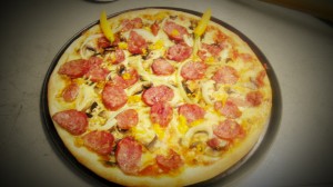 Raging Bull Pizza - home made pizza sauce, mozzarella, smoked beef salami, mushrooms, onion and fresh chilli - Very hot
